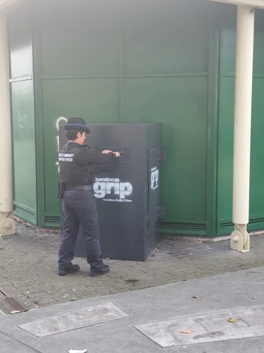 PCSO emptying the knife bin in Morecambe